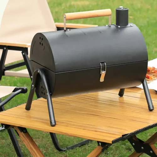 8d5296ba1ad14b30820be943016a080a-goods.webp Portable Charcoal Grill - Perfect for Outdoors